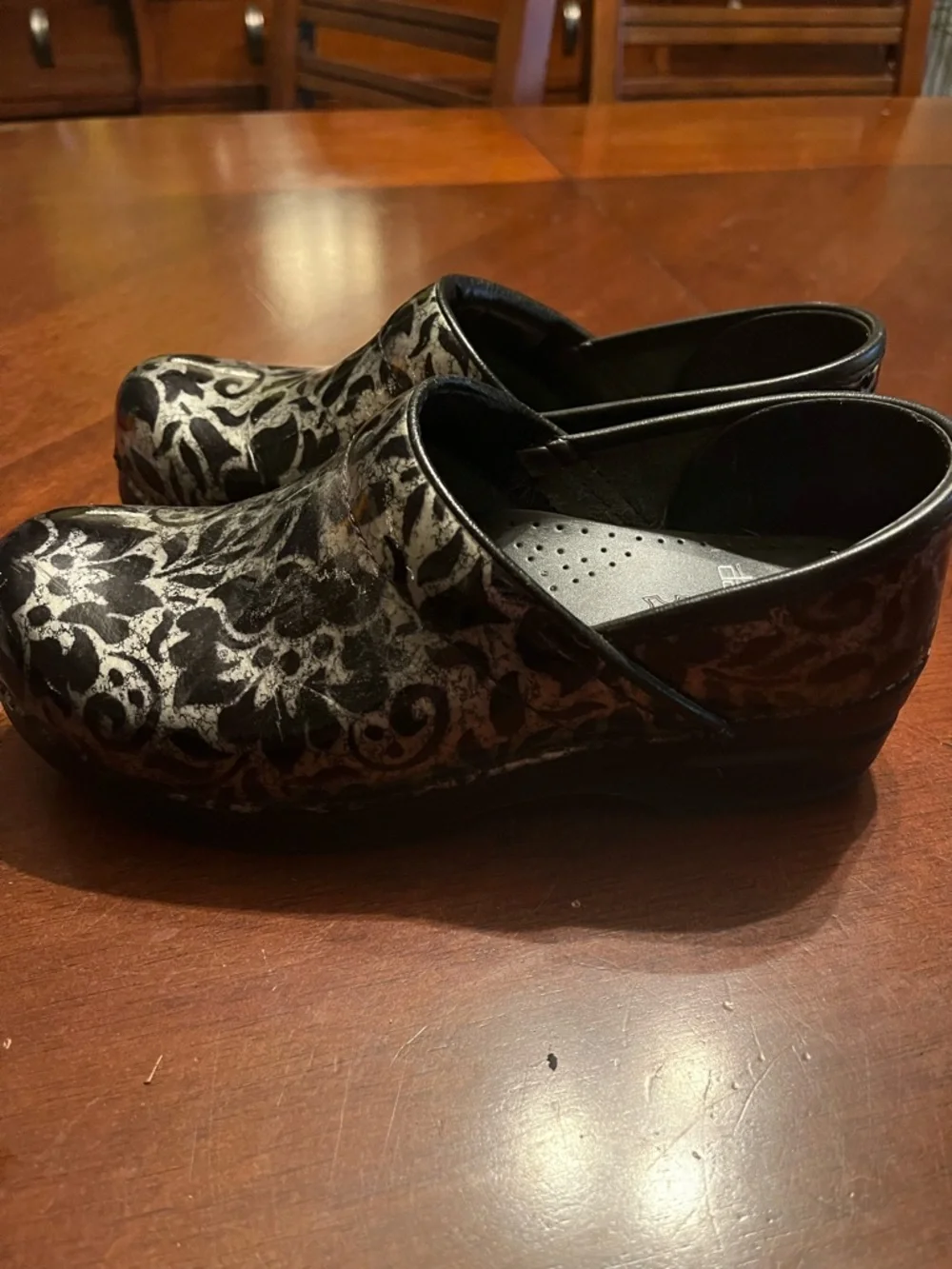 Dansko Black and Silver Floral Patent Clogs with Metallic Accents - Picture 2 of 7